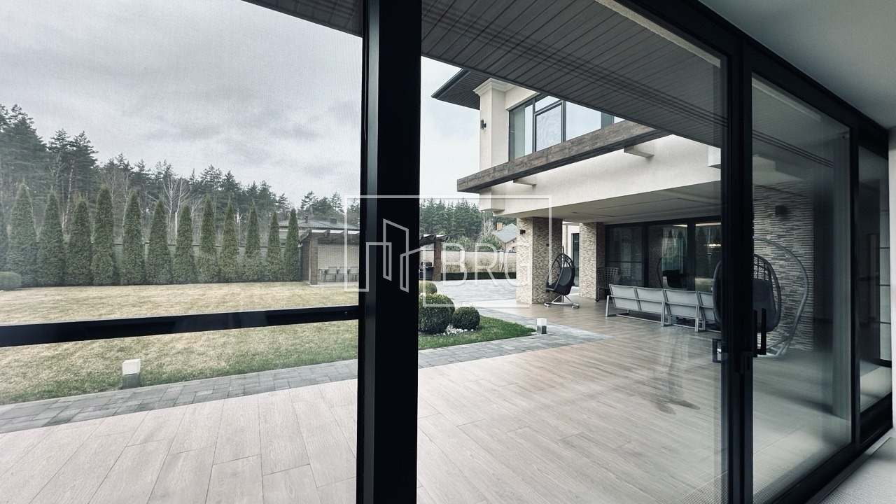 Современный дом 680м с бассейном в коттеджном городке Иванковичи. Київська обл